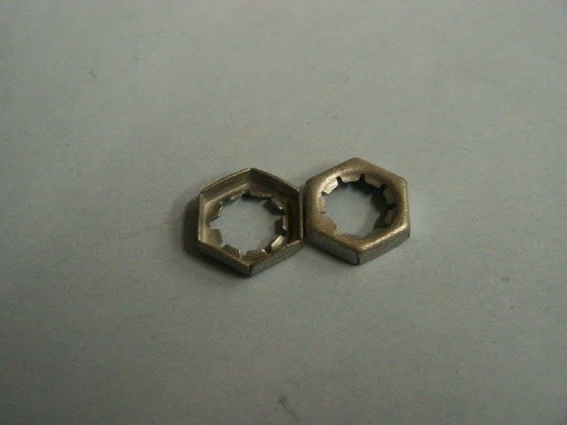 1000336 NUT SET FRONT UPPER SHOCK LOCK NUT